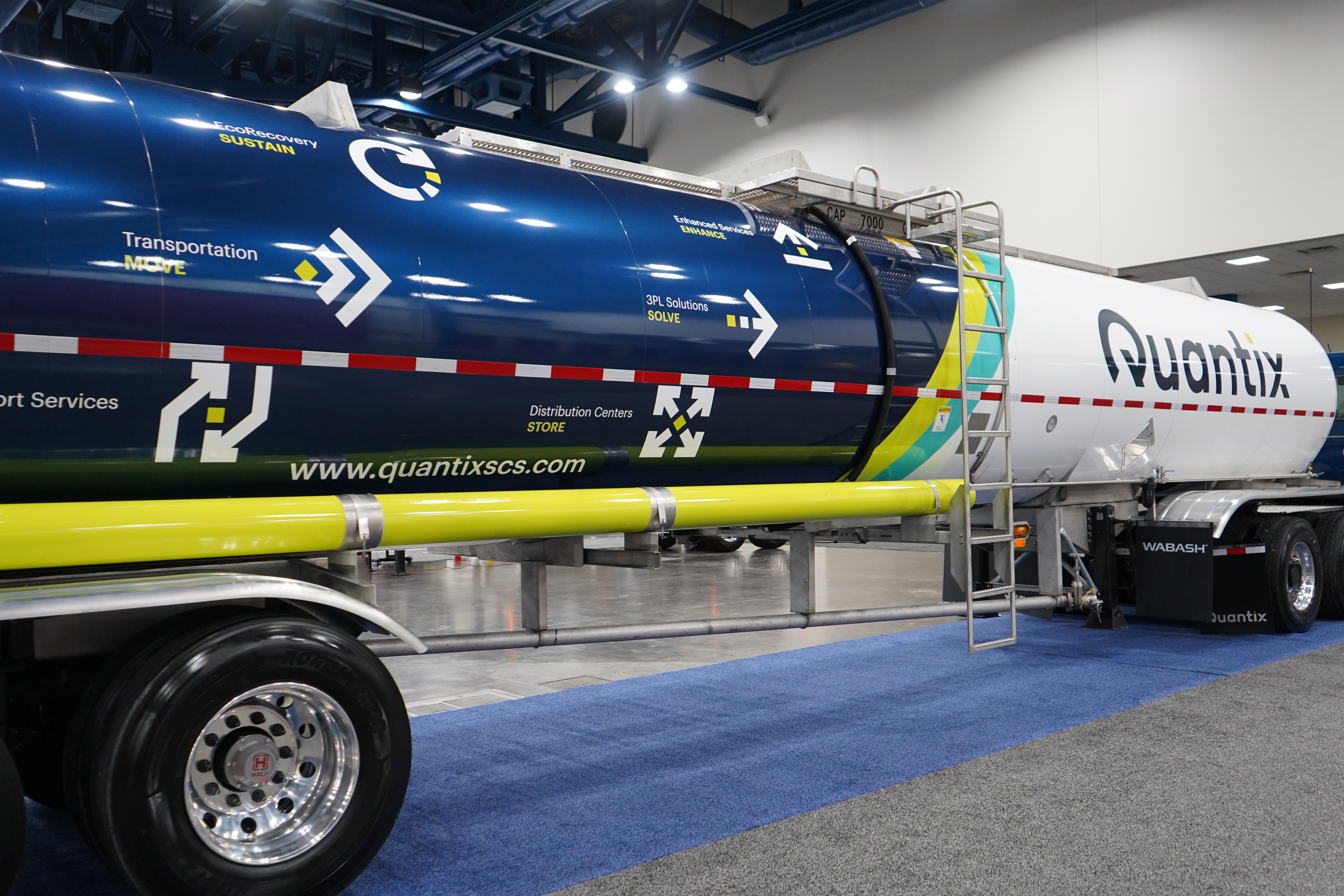 Quantix trailer featuring branded messaging for transportation, 3PL, and distribution services